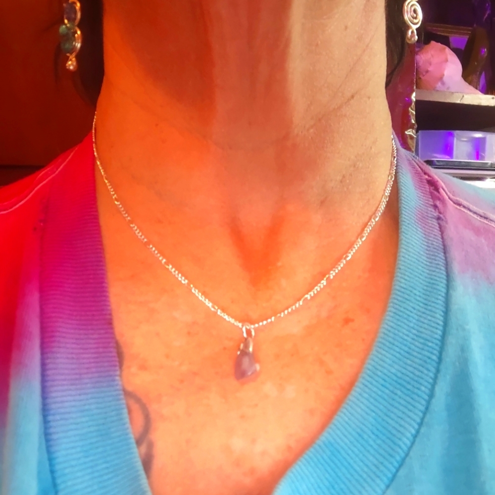 Sterling Silver bail holding Amythyst Chrystal Braided chain